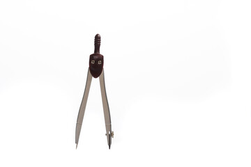 close-up of compass isolated on white background with copy-space