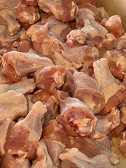 raw chicken meat on the kitchen counter