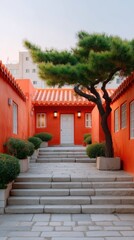 Fototapeta premium Vibrant Red Traditional Building Courtyard With Stone Steps Green Tree and White Door Under Soft Daylight