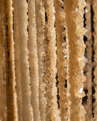 traditional Uzbek crystal sugar, navat, hanging in lines