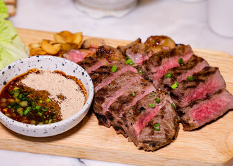 Grilled Steak sliced and ready to be served, a culinary delight for the gourmet's table