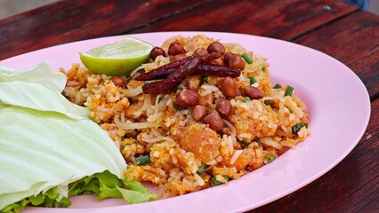 Crispy rice and soured pork sausage salad.