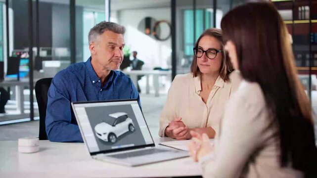 Happy Family Handing Configuring And Ordering New Car
