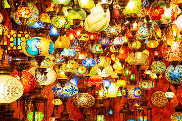 Fototapeta premium Traditional colorful Turkish lamps at the Grand Bazaar. Stained glass mosaics.