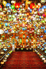 Traditional colorful Turkish lamps at the Grand Bazaar. Stained glass mosaics. © lizavetta