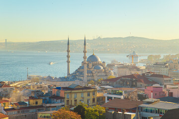 Naklejka premium Sunrise in Istanbul. The New Valide Sultan Mosque and the Çamlıca Mosque in the background.