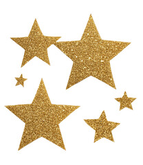 Glittery gold stars shimmer against a dark background