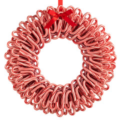 Festive candy cane wreath with red bow for holiday season decor