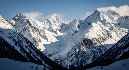 Snowy mountain peaks under a bright blue sky in a winter landscape