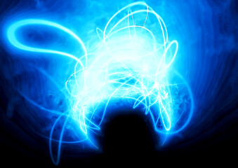 Blue Energy Flow — Abstract Neon Light Motion Background.Abstract background of glowing blue light trails forming dynamic energy waves.