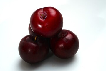 Fresh ripe red plums close-up for healthy eating
