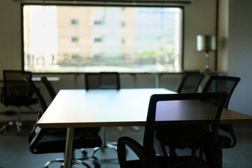 Meeting table focus on chair at office workplace