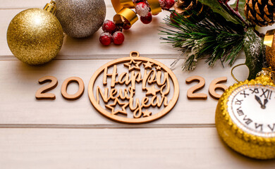 Happy new year 2026 on wooden white background
