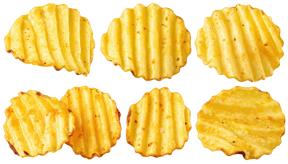 Crispy, wavy potato chips arranged in two rows on black backdrop