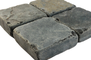 Four paving stones isolated on a white background