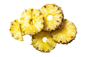 Sliced golden pineapple rings arranged on black background