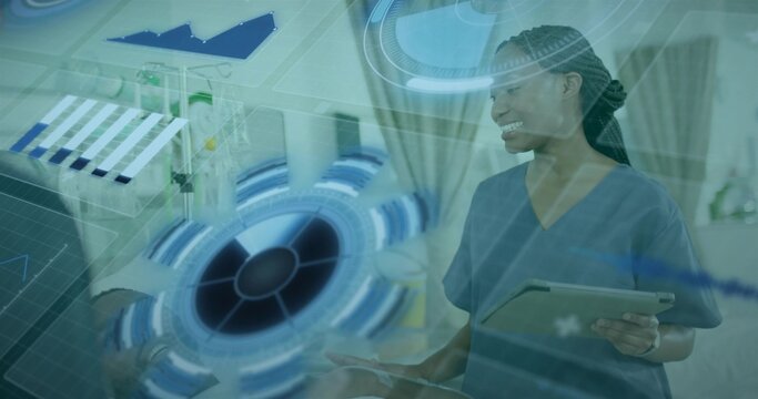 Reviewing nurse in blue scrubs examining data on tablet in clinical room, with holographic charts - Powered by Adobe