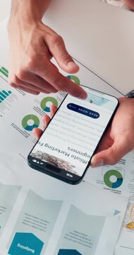 Hands, phone screen and documents for marketing at office with affiliate program, article or tips on web. Person, smartphone and scroll with app ui, news and research for project at creative agency