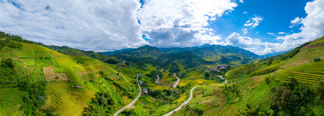 Aerial view of golden rice terraces at Mu Cang Chai town near Sapa city, North of Vietnam....