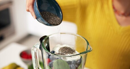 Blender, chia seeds and hands of woman with smoothie in morning for healthy drink, diet and detox. Home, protein shake and person with ingredients, fruit and food for nutrition, wellness and vitamins