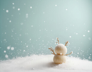 Minimalist winter scene with a tiny decorative snowman and falling snow on a soft teal background. Perfect copy space for Christmas, holiday, or New Year branding.