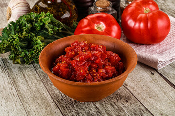 Diced ripe tomato with sauce