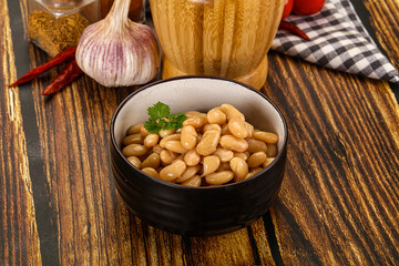 Baked white canned beans in the bowl