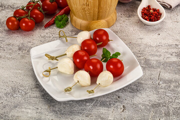 Mozzarella with cherry tomato canape