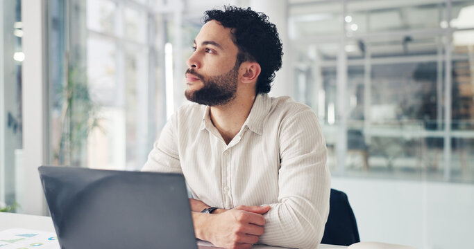 Businessman, laptop and thinking with decision in office for business vision, idea or ambition. Thoughtful, man or employee contemplating with computer for company improvement or career opportunity
