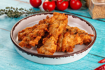 Golden crispy fried chicken strips