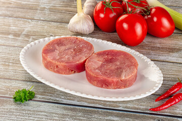 Raw round tuna fish fillet