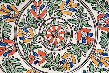 close up of  ornamental ceramic plate background