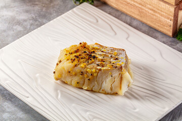 Steamed cod fish fillet with spices