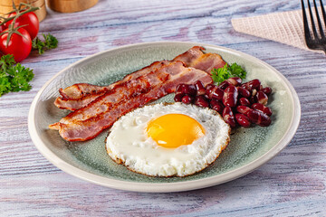 English breakfast with egg, bean and bacon