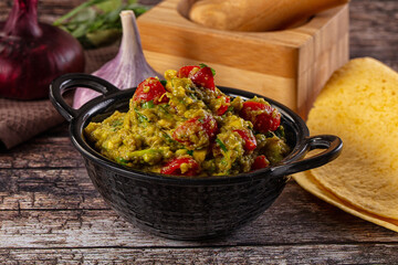 Green spicy Mexican guacamole dip