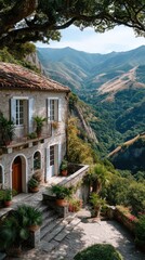 Fototapeta premium Historic Stone Building With White Shutters Overlooking Lush Green Mountain Valley On A Sunny Day