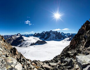 Sunny landscape of snow-capped mountains and a bright blue sky