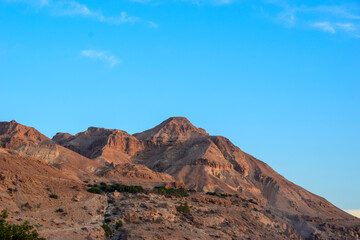 Judean Desert mountains under clear blue sky