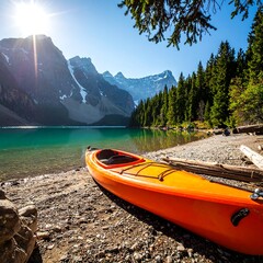 Sunny landscape showcasing a vibrant orange kayak near clear waters and mountains