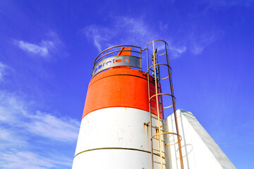 capbreton city red white lighthouse on french atlantic coast town hossegor in landes france in blue summer sky