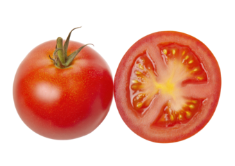 Whole and halved ripe red tomato on a black background
