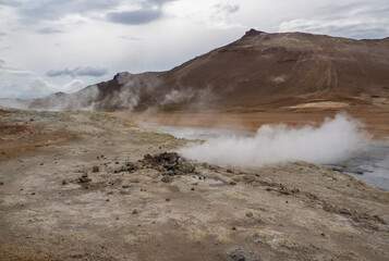 mountains and geysers in Hverir in Iceland