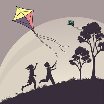 Children flying kites in a landscape silhouette scene
