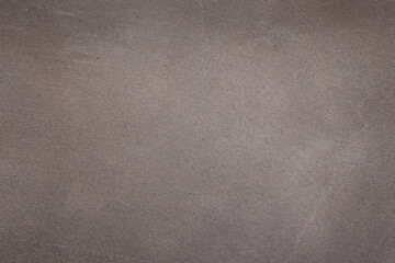 Gray concrete wall texture with grunge and weathered surface, ideal as architectural or industrial background for construction, renovation, urban and abstract design projects © Marta Nogueira