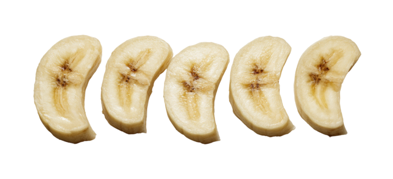 Five cross-sections of a ripe banana sliced into curved pieces