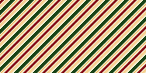 A diagonal stripe pattern in traditional Christmas colors. A festive seamless background for the holiday season, gift wrapping, and winter holiday concepts.