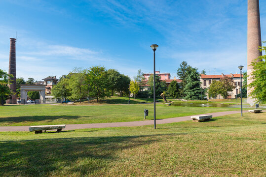 Busto Arsizio city, Italy, street Indipendenza with the Milani public park. It stands where there was once a textile company, as can be seen from the presence of two smokestacks