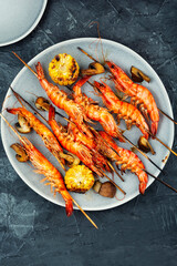 Tasty langoustines shrimp kabobs grilled.