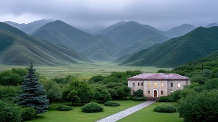 Stone Monastery Building Nestled Amidst Lush Greenery and Rolling Misty Mountains Under a Cloudy Sky