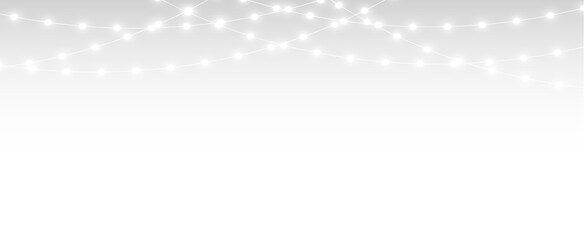 Fototapeta na wymiar Christmas glowing string light and garland streamer overlay with soft bokeh festive illumination.